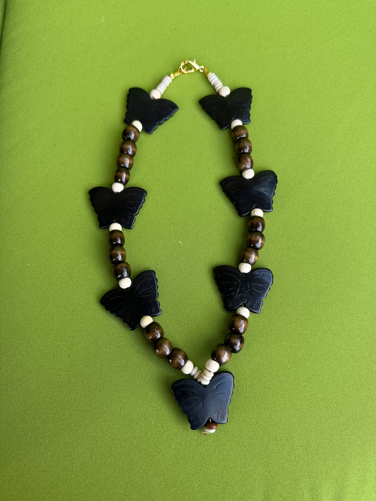 brown and black butterfly necklace