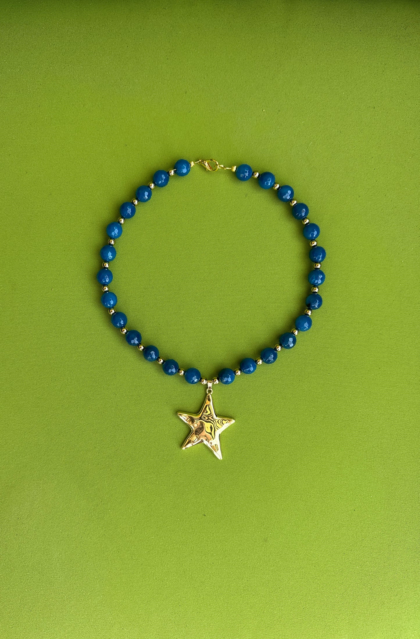 Blue Beaded necklace with gold star