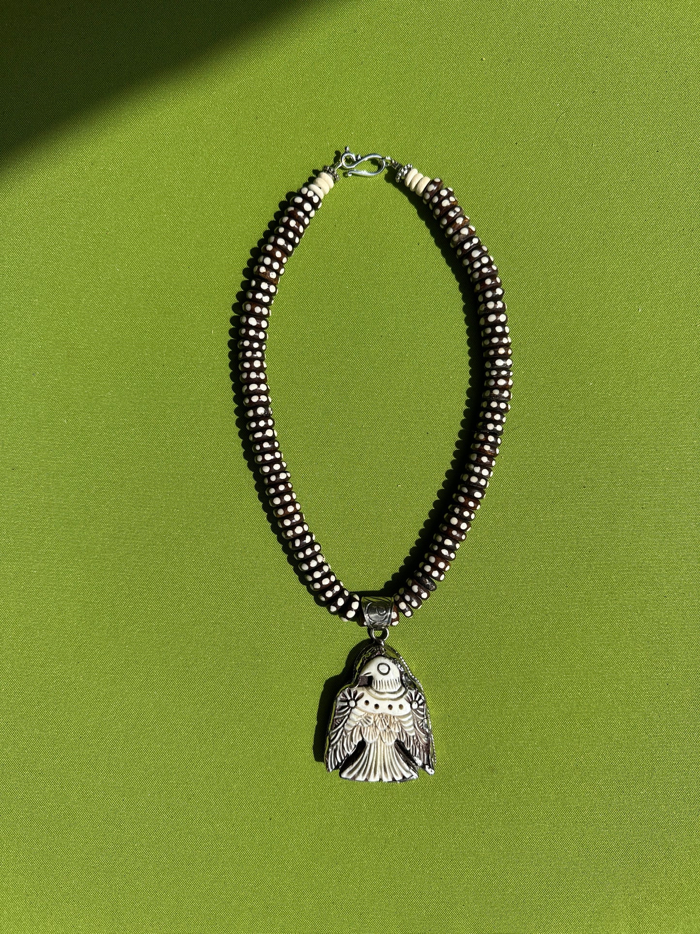 Brown eagle necklace
