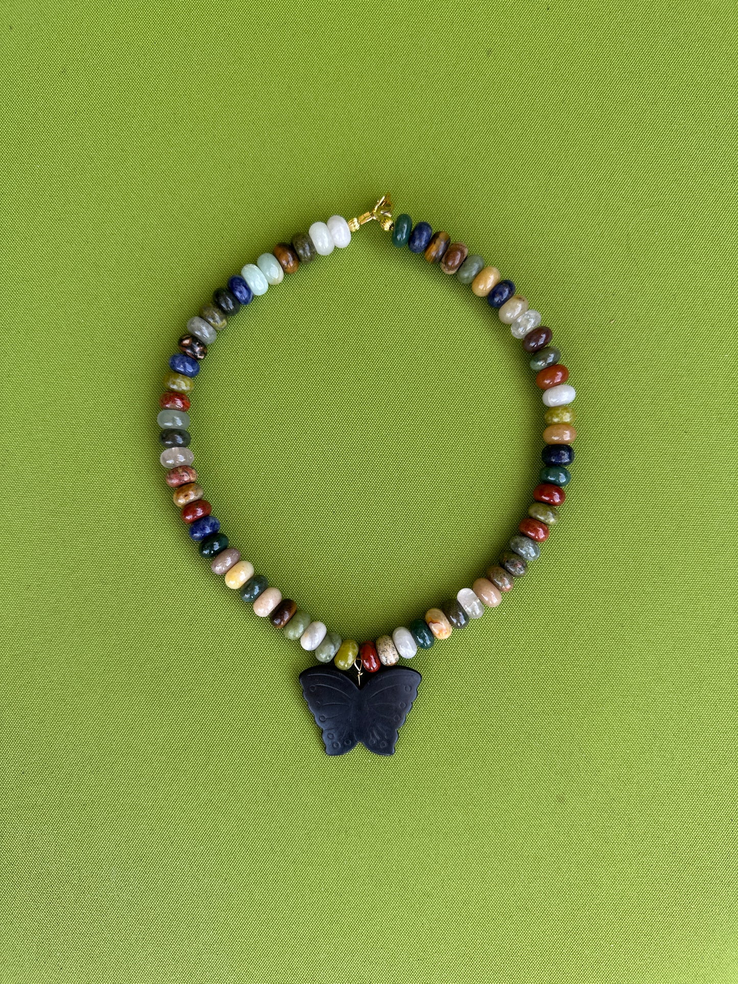 Black butterfly with Multi colored stone necklace