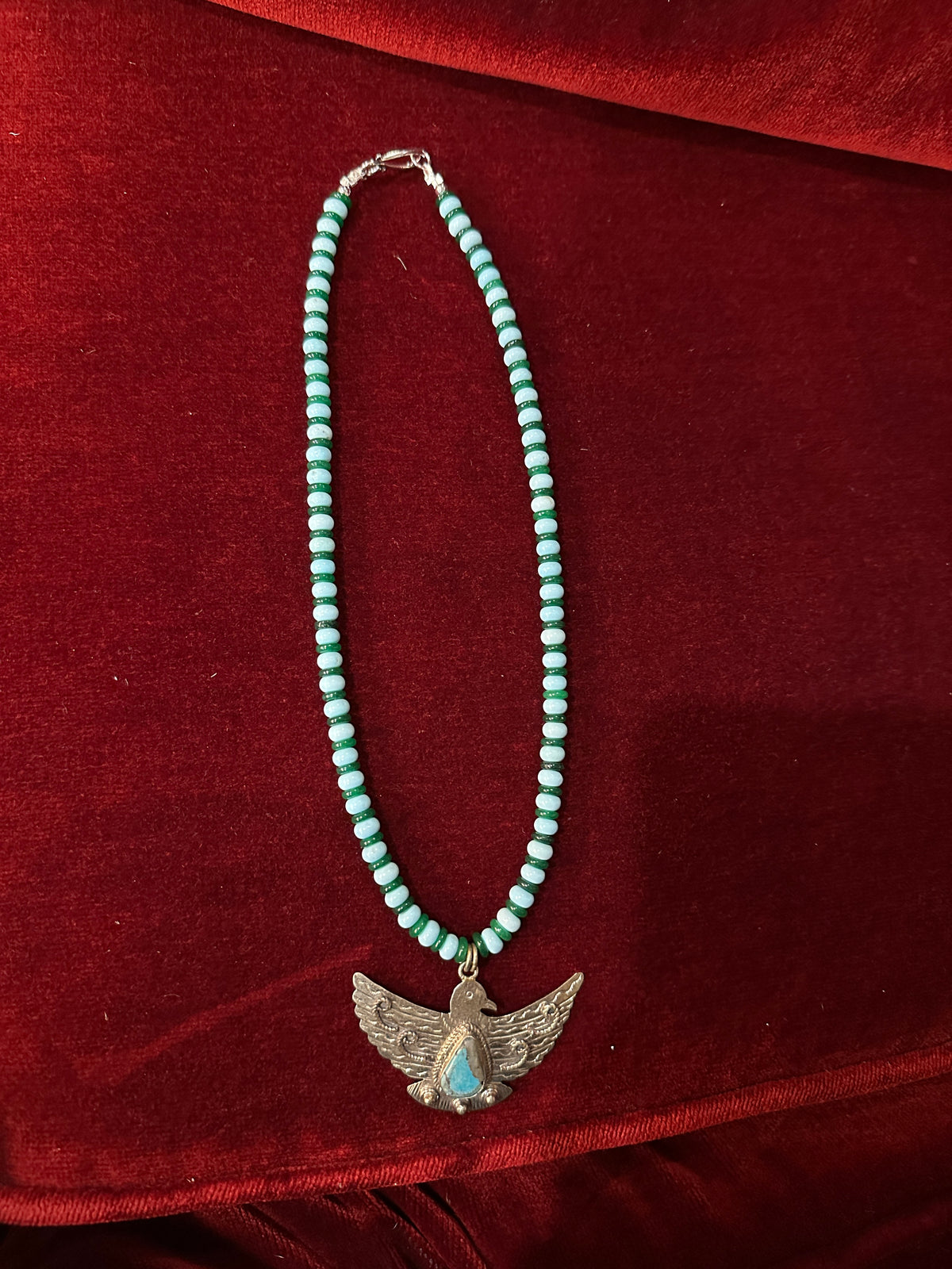 green and blue bird necklace